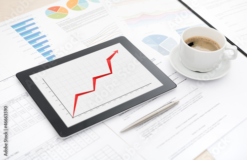 Photo: Success business with digital tablet Success business with digital tablet