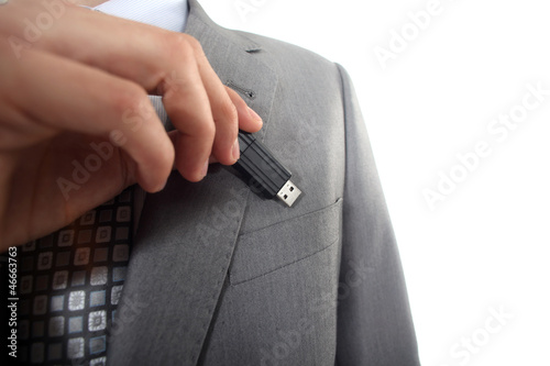 Photo: Businessman with USB key in hand Businessman with USB key in hand