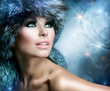 Winter Christmas Woman Portrait. Beautiful Girl in Fur Hat
