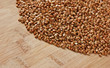Photo: buckwheat groats on a wooden table buckwheat groats on a wooden table