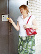  woman opening door with electronic key