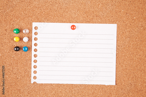 Photo: Cork bulletin board with notes. Cork bulletin board with notes.