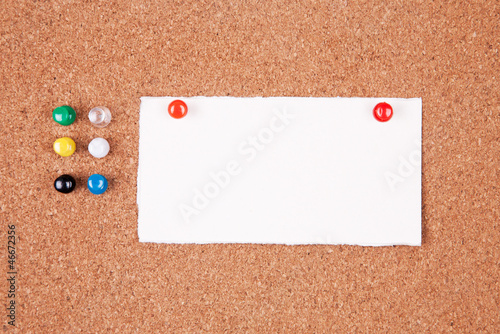 Photo: Cork bulletin board with notes. Cork bulletin board with notes.