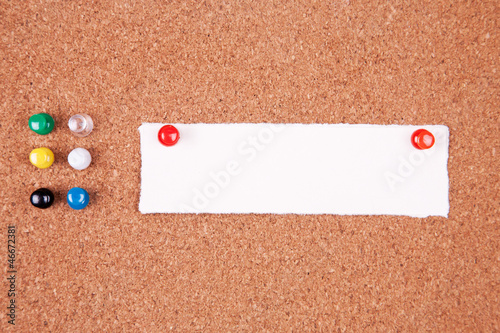 Photo: Cork bulletin board with notes. Cork bulletin board with notes.