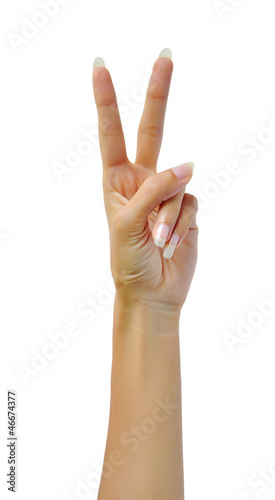 Photo: Woman hand making sign Woman hand making sign