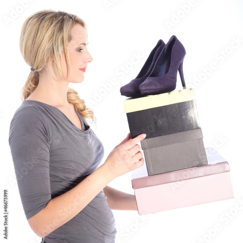 Photo: Happy Blonde Woman Holding Boxes of Shoes Happy Blonde Woman Holding Boxes of Shoes