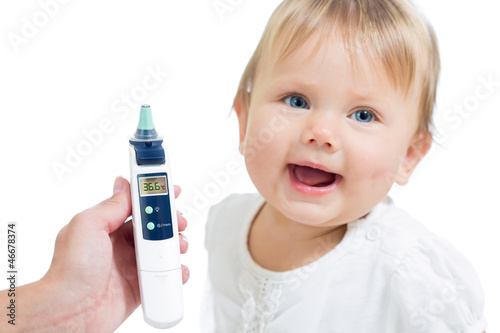Photo: Thermometer displaying 36,6 Celsius degrees on defocused happy k Thermometer displaying 36,6 Celsius degrees on defocused happy k