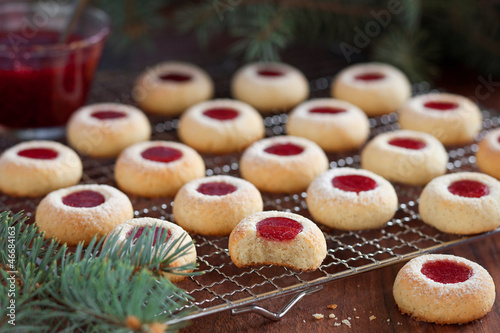 Photo: Almond biscuits with jam filling, selective focus Almond biscuits with jam filling, selective focus