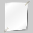 Blank white sheet of paper stuck to the wall.