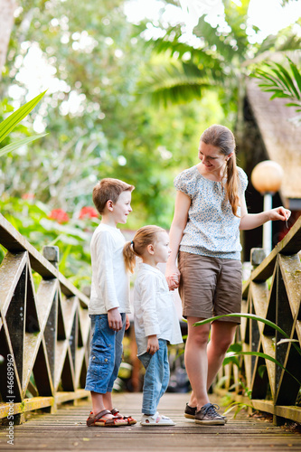 Photo: Family at tropical jungle resort Family at tropical jungle resort