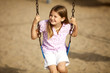 Photo: Girl swinging Girl swinging