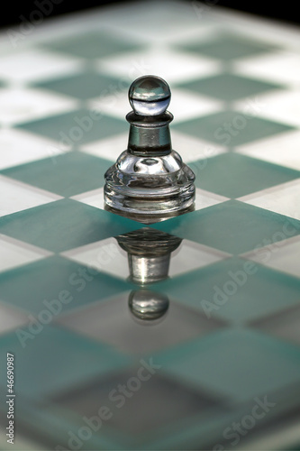 Photo: Pawn chess piece - business concept series: growth, promotion. Pawn chess piece - business concept series: growth, promotion.
