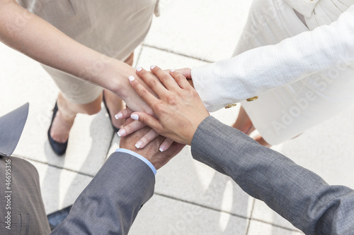 Photo: Businessman & Businesswomen Team Hands Together Businessman & Businesswomen Team Hands Together