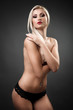 Foto: Beautiful topless woman covering her breasts with her arms Beautiful topless woman covering her breasts with her arms