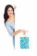 Beautiful shopping Christmas woman with bag.
