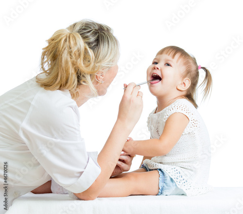 Photo: doctor examining baby isolated on white background doctor examining baby isolated on white background
