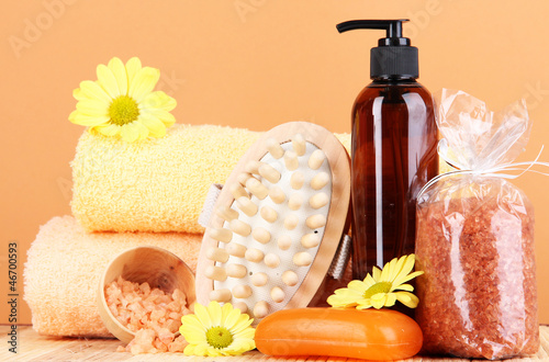 Photo: Set for care of a body on peach background Set for care of a body on peach background