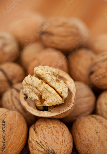 Photo: walnuts on wooden table walnuts on wooden table