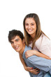 Cute boyfriend piggybacking his girlfriend.