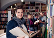 Photo: Smiling student in library Smiling student in library