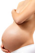 Photo: Pregnant woman touching her belly Pregnant woman touching her belly