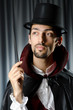 Magician doing tricks on white