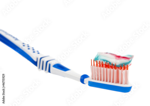 Photo: toothpaste with toothbrush isolated toothpaste with toothbrush isolated
