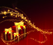 Geschenkpäckchen mit goldene Schleife auf rotem Hintergrund