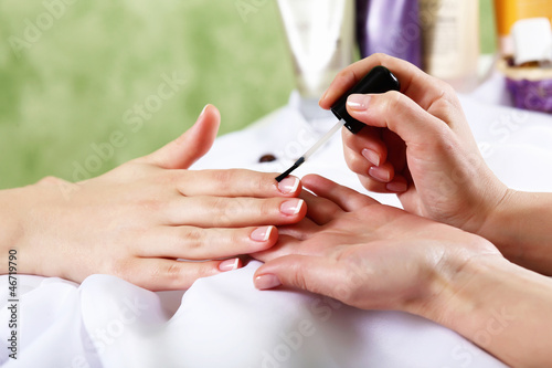Photo: Female hands and manicure related objects Female hands and manicure related objects