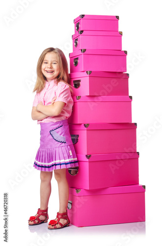 Photo: Little cute girl with lots of boxes Little cute girl with lots of boxes