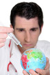 Doctor immunizing the world