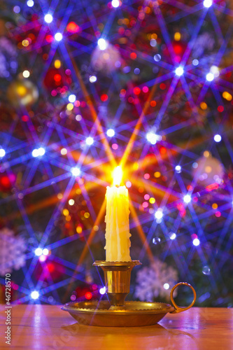 Photo: Christmas candle and tree Christmas candle and tree