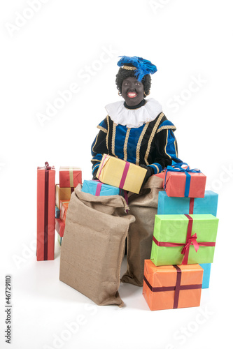 Photo: Dutch black pete with many presents Dutch black pete with many presents