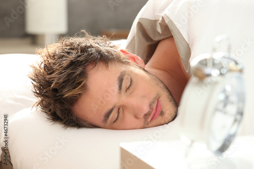 Photo: a man sleeping a man sleeping