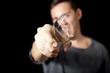 Man with broken drink glass