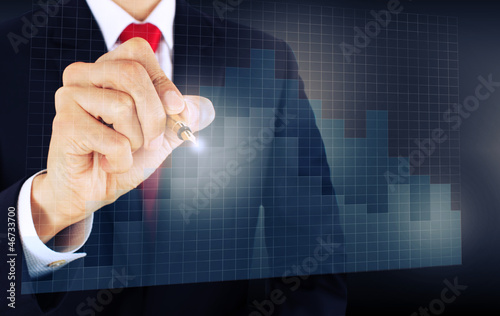 Photo: businessmen draw a graph businessmen draw a graph