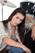 She plays the drums