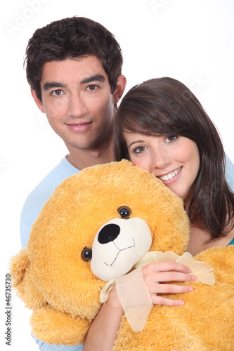 Photo: Teenagers with a large teddy Teenagers with a large teddy