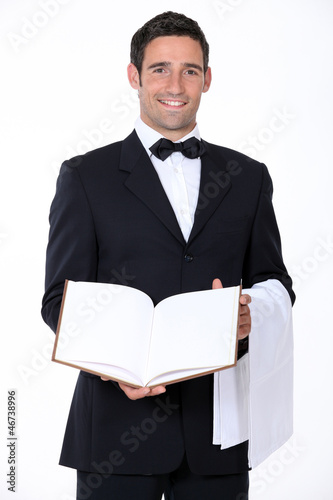 Photo: A waiter of a fancy restaurant. A waiter of a fancy restaurant.