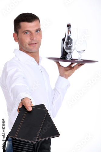 Photo: Waiter holding tray, studio shot Waiter holding tray, studio shot