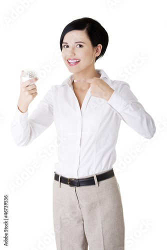 Photo: Businesswoman showing led bulb Businesswoman showing led bulb