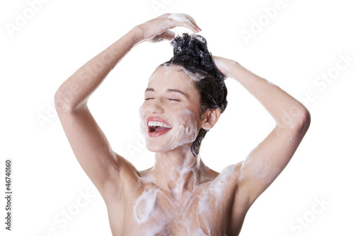 Photo: Young fit beautiful woman in shower Young fit beautiful woman in shower