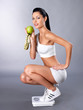 Health woman stands on scales