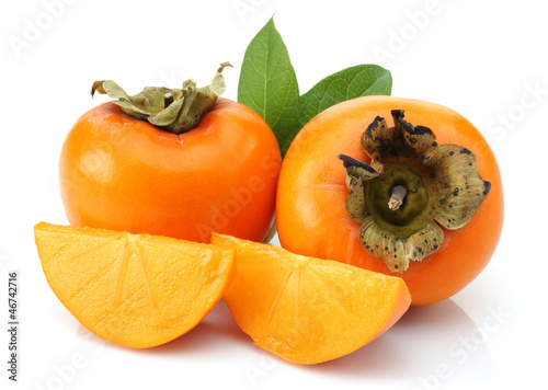 Photo: Slice persimmons with green leaves Slice persimmons with green leaves
