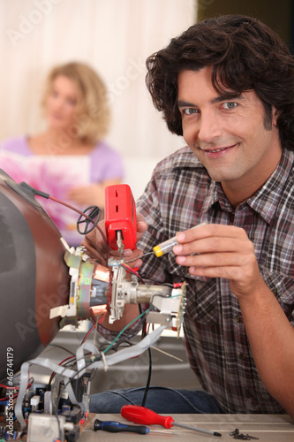 Photo: TV repair technician TV repair technician