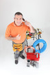 full-length portrait of experienced craftsman making a call