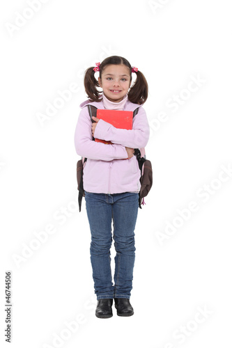 Photo: Schoolgirl isolated on white background Schoolgirl isolated on white background