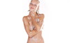 Stunning naked woman washing her body with soap