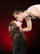 Young man kissing a girl