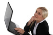 Woman typing on her laptop